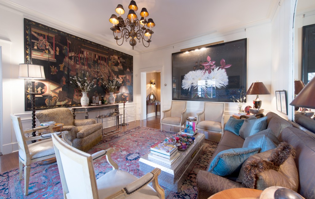 An eclectic mix of furnishings lend to the study of gordon’s works, on display in his living room.