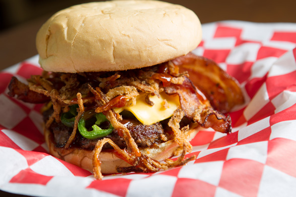 Burgers are topped with anything imaginable at The Cow Calf-Hay. Photo by Brent Fuchs.