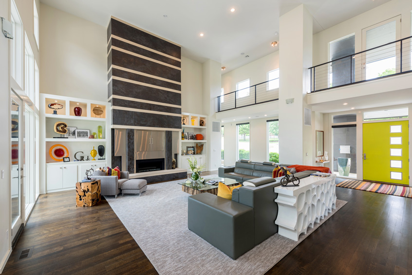 Forged steel railings throughout the home were created by Rob Key of Rob Key Designs.
