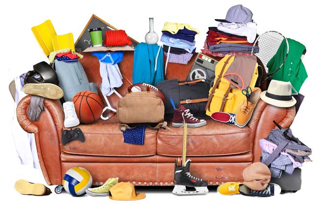 Large leather sofa with a bunch of different things