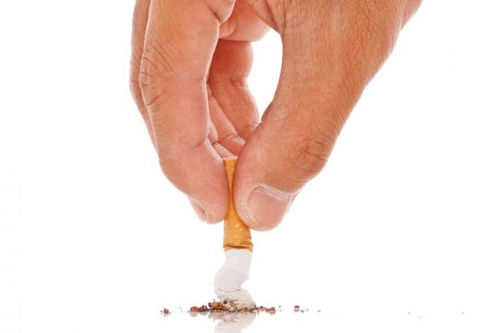 Hand Putting Out a Cigarette