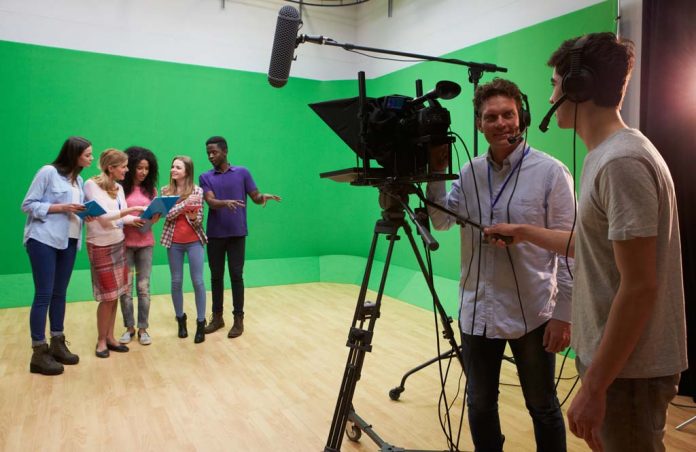 Students On Media Studies Course In TV Studio