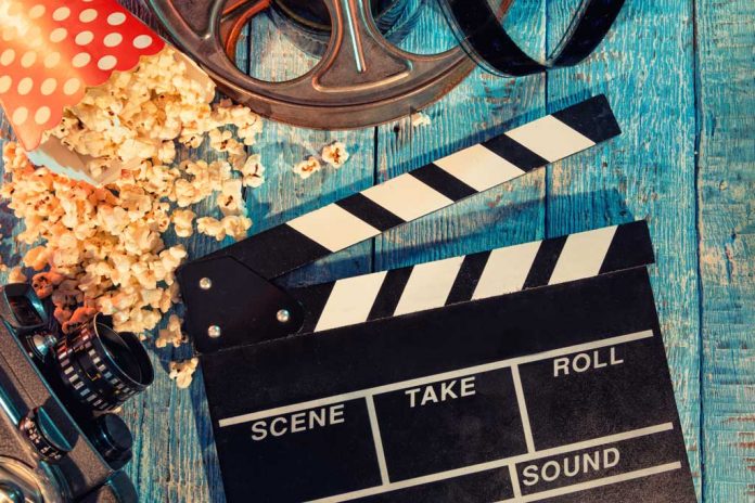 Film camera chalkboard , roll and popcorn