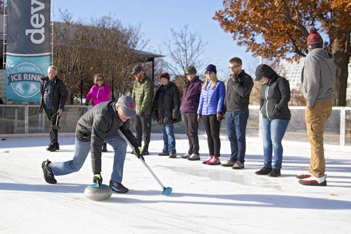 OKC residents take a curling class at the Devon Ice Rink.