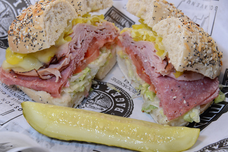 The Italian includes pastrami, ham, banana peppers, Italian dressing, lettuce and tomato piled high on an everything bagel. Photo by Natalie Green. 