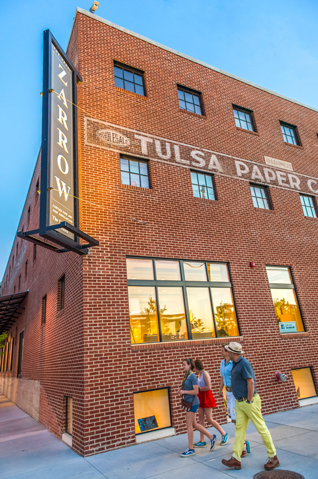 Guests attend the First Friday Art Crawl at the Zarrow Center.
