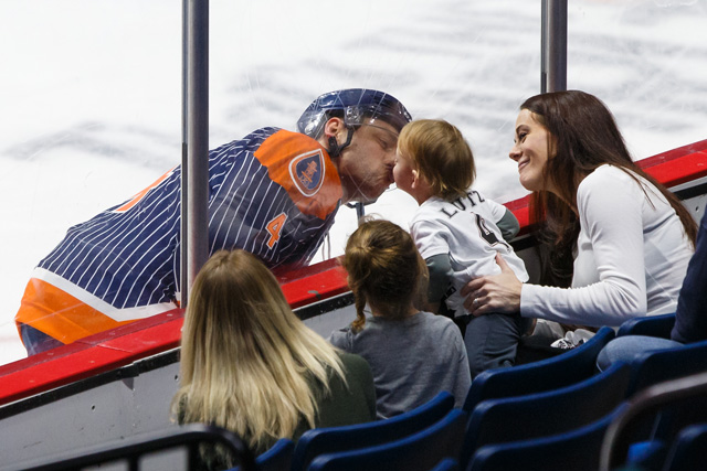 Oilers Defenseman Nathan Lutz interacts with his family. Photo by Kevin Pyle Photography.